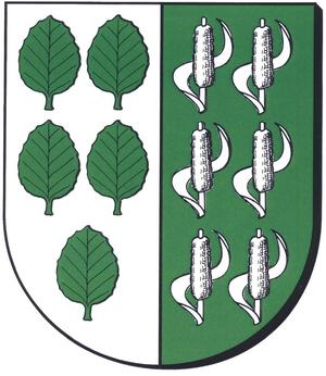 Bild vergrößern: Sie sehen das Wappen der Gemeinde Huy. Die Blasonierung sieht wie folgt aus: Gespalten in Silber und Grün; Vorn 5 (2:2:1) steigende grüne Buchenblätter; Hinten	6 (2:2:2) silberne Schilfstängel im Blatt